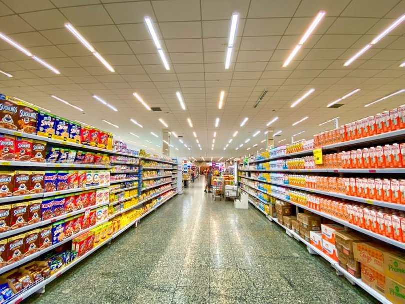 Supermarket shelf filled with processed foods